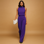 Women’s elegant halter jumpsuit with wide legs, high waist, and decorative bow detail, perfect for parties, dinners, and evening outings.
