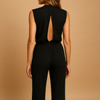 Women’s elegant halter jumpsuit with wide legs, high waist, and decorative bow detail, perfect for parties, dinners, and evening outings.