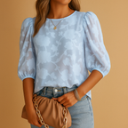 Women’s floral blouse top with chic pattern and flattering fit, perfect for casual days or formal occasions.