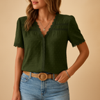 Women’s lace V-neck blouse with intricate details and flattering fit, ideal for work, evenings out, and elegant special occasions.