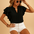Women’s sleeveless elegant blouse with tailored fit and light fabric, perfect for office wear, evenings out, or casual chic looks.