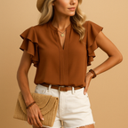 Women’s sleeveless elegant blouse with tailored fit and light fabric, perfect for office wear, evenings out, or casual chic looks.