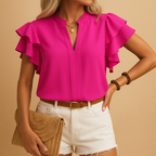 Women’s sleeveless elegant blouse with tailored fit and light fabric, perfect for office wear, evenings out, or casual chic looks.