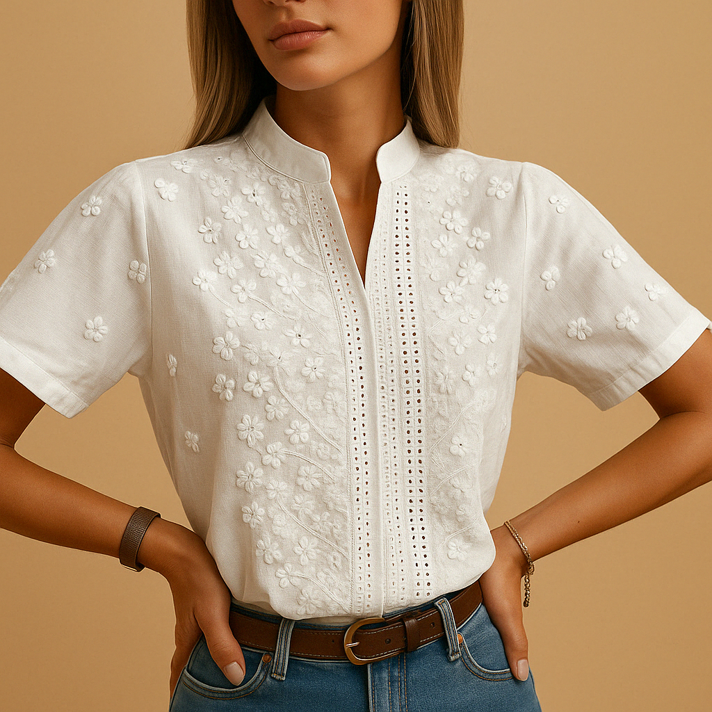 Women’s white blouse with classic collar and button-down design, perfect for work, casual outings, and stylish evening looks.