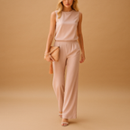 Women’s wide leg jumpsuit with round neck and mid-waist fit, perfect for work, evenings out, and elegant special occasions.